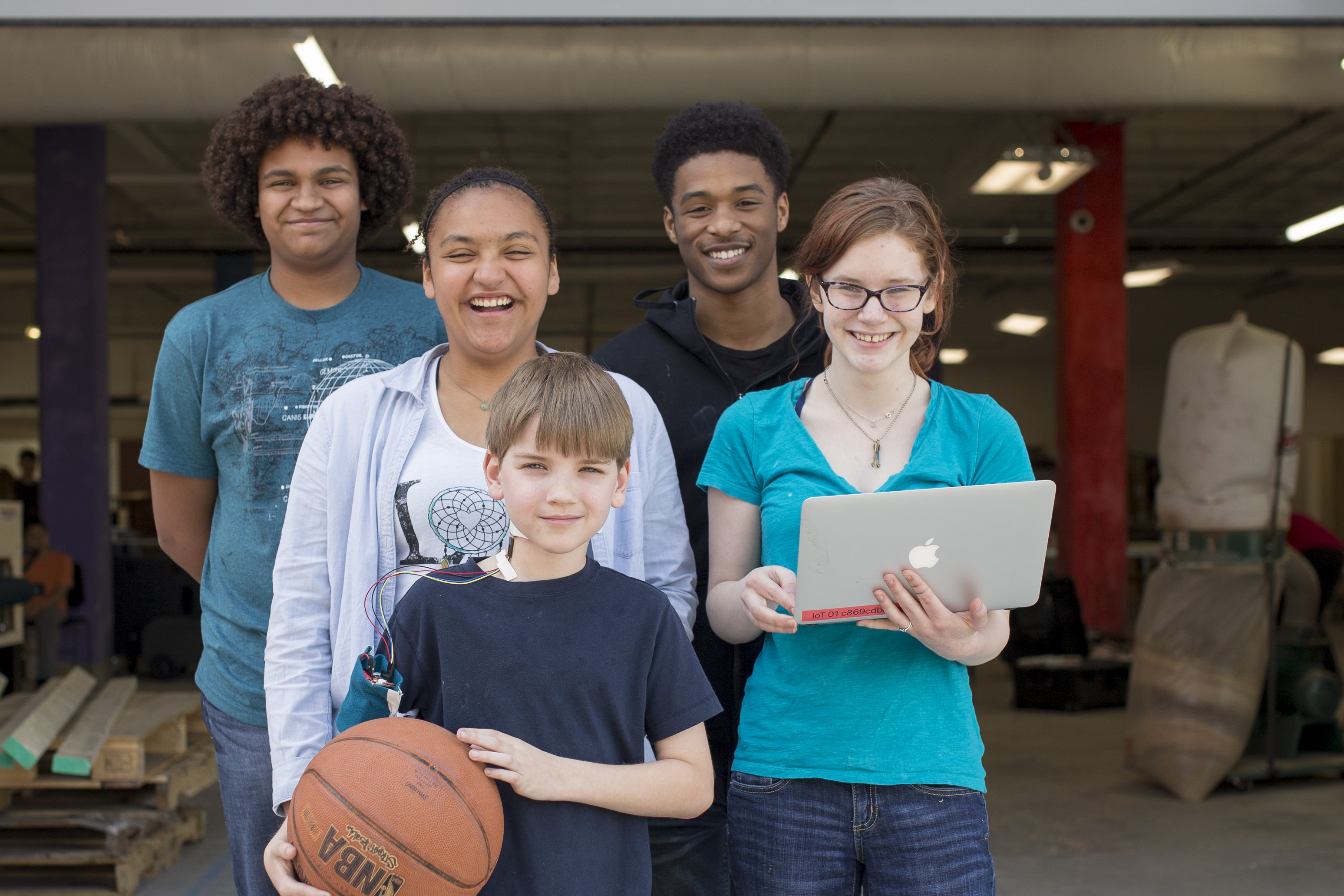 (Back row, from left) Ebben Blake of Crete, Brandon McMiller of Omaha; (middle row, from left) Ilysah Blake of Crete, Grace Hessenthaler of Omaha; and (front row) Matthew Farritor of Lincoln participate in the Incredible Wearables engineering design challenge. Nebraska youth will join thousands of others around the world in the 10th annual 4-H National Youth Science Day challenge on Oct. 4.