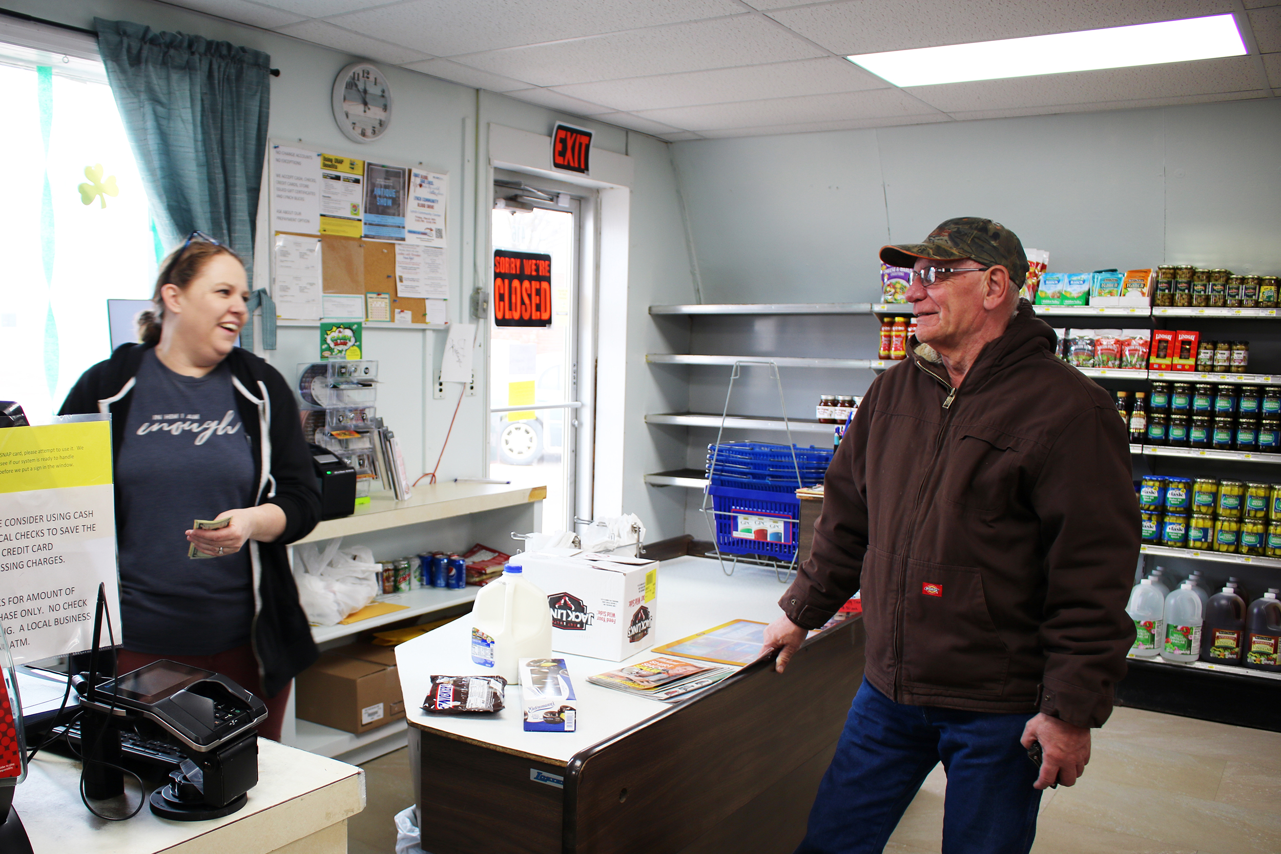 Volunteers from Lynch help unload groceries from the delivery truck.