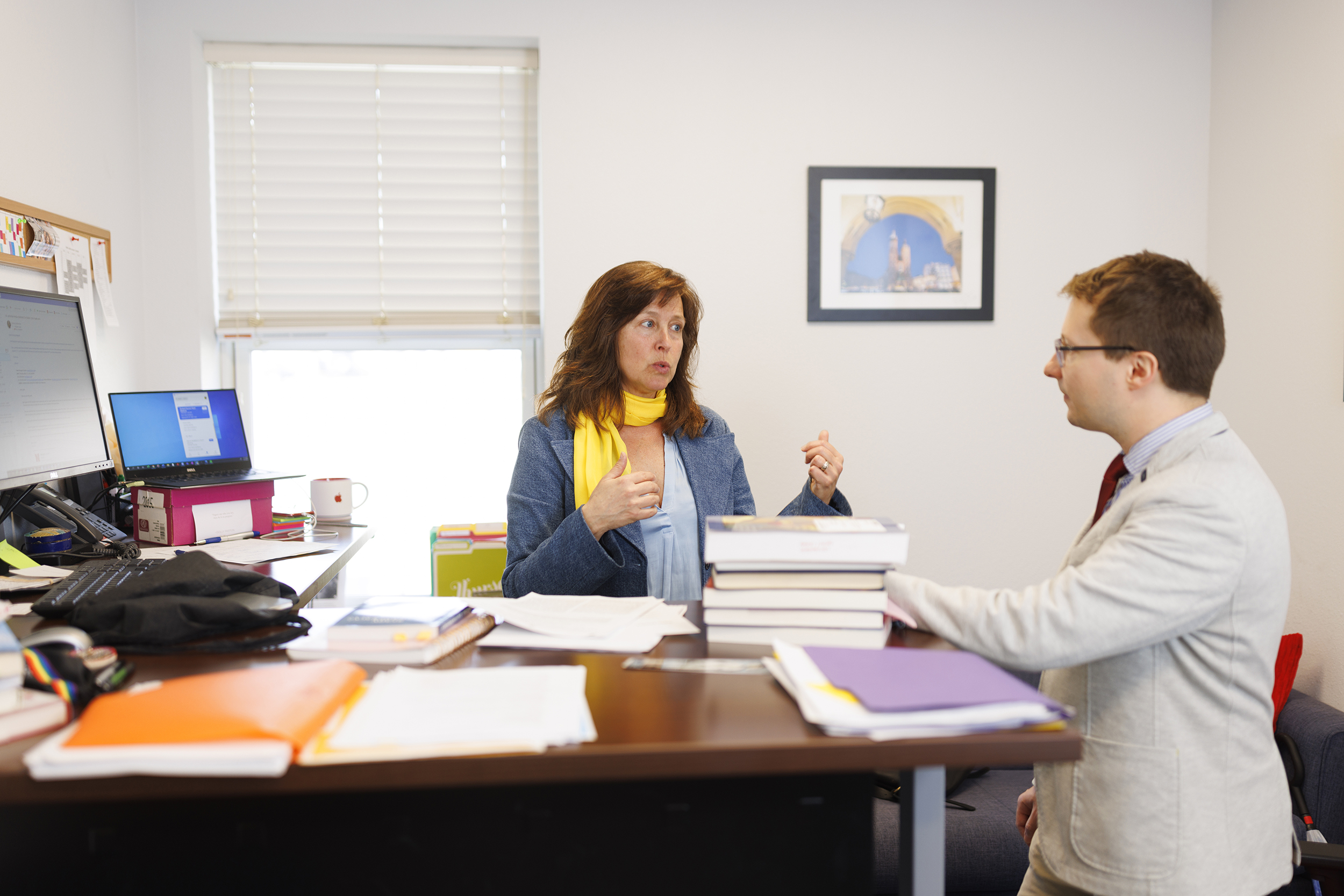 Patrice McMahon, professor of political science, with Lukasz Niparko, a graduate student from Poland who has worked with her on her research.