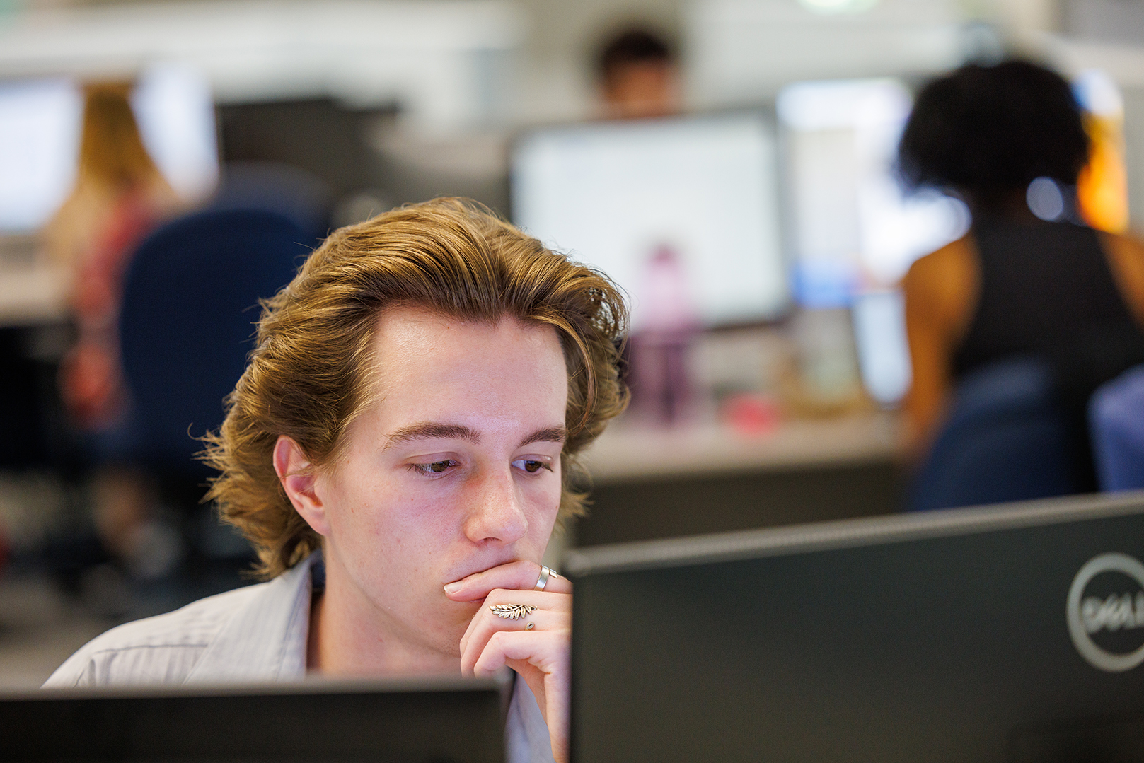 Ethan Dunn, a senior political science major and UCARE student from Omaha, works on a computer.