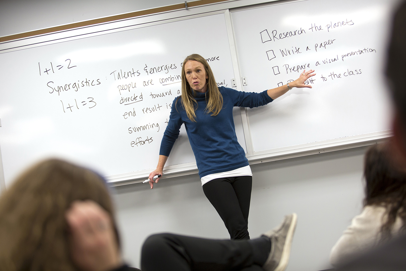Lindsay Hastings, a professor in the Department of Agricultural Leadership, Education and Communication, stands in front of a whiteboard.