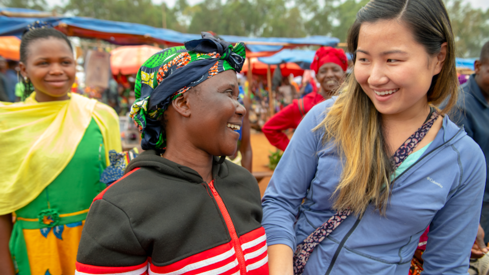 A Peace Corps volunteer talks to a community member in Tanzania. Students can learn more about Peace Corps service and the new certificate program available to Nebraska students at the launch event Sept. 28. // Photo Credits: © PEACE CORPS, Tanzania