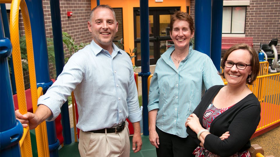 Paul Springer (from left), Judy Burnfield and Natalie Williams at the Alexis Verzal Children’s Rehabilitation Hospital in Lincoln, where they are researching the impact of massage therapy for parents whose children are in rehabilitation.