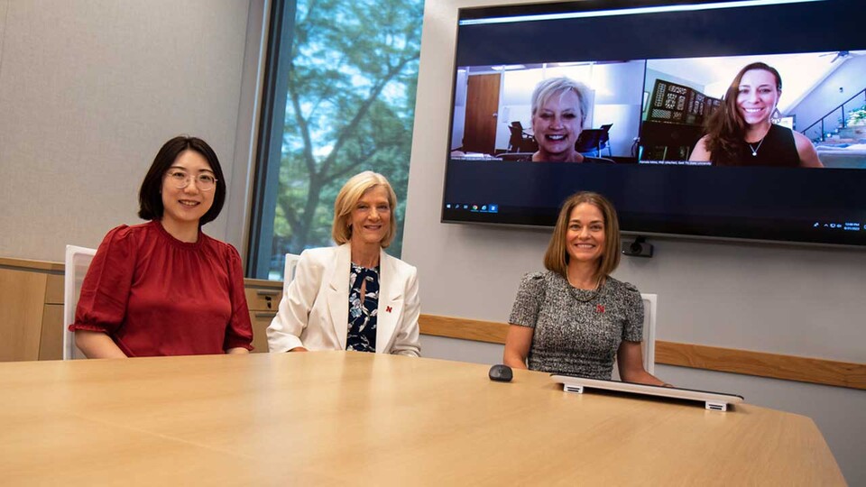 From left, CYFS researchers HyeonJin Yoon, Sue Sheridan and Amanda Witte, CYFS research assistant professor, collaborate virtually with East Tennessee State University partners Kim Hale, left, and Pam Mims. (Kyleigh Skaggs, CYFS)