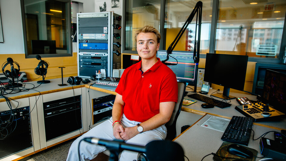 Schrantz, a junior sports media & communication and broadcasting double major from Orchard Park, NY, pictured here in the KRNU headquarters.  
