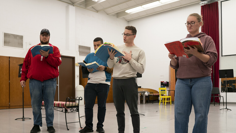 Left to right:  Noah Shannon, Joshua Pitt, Samuel Kennedy and Rachel Sweeney rehearse “The Marriage of Figaro” in Westbrook Music Building. Performances are Nov. 11 and 13 in Kimball Recital Hall. Photo by Laura Cobb.