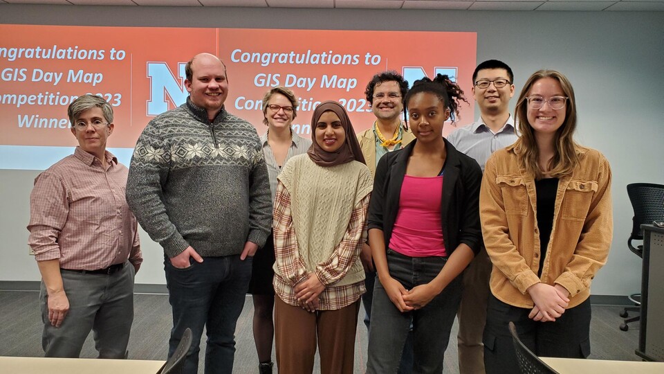 Winners of the GIS Map Competition come together with the judges of the competition to receive their awards. 