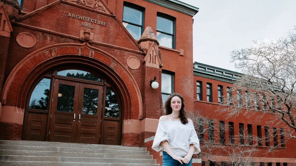 Pictured here in front of Architecture Hall, Willoughby – who grew up in Montreal – hopes to continue to use architecture to support nonprofits and underserved communities throughout her career.  