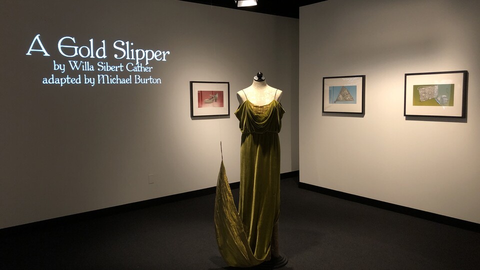 A green velvet dress based on Willa Cather's writing is part of the exhibition "A Gold Slipper," on view through Jan. 21 at the Robert Hillestad Textiles Gallery.