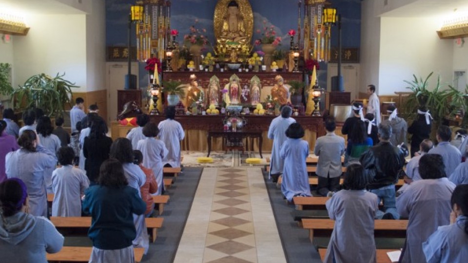 Members of the Ling Quang Buddhist Center, a Buddhist temple south of Lincoln whose congregation is almost entirely Vietnamese immigrants and their families, pray together on a Sunday morning. This photograph, by former student Dan Holtmeyer, is from his 