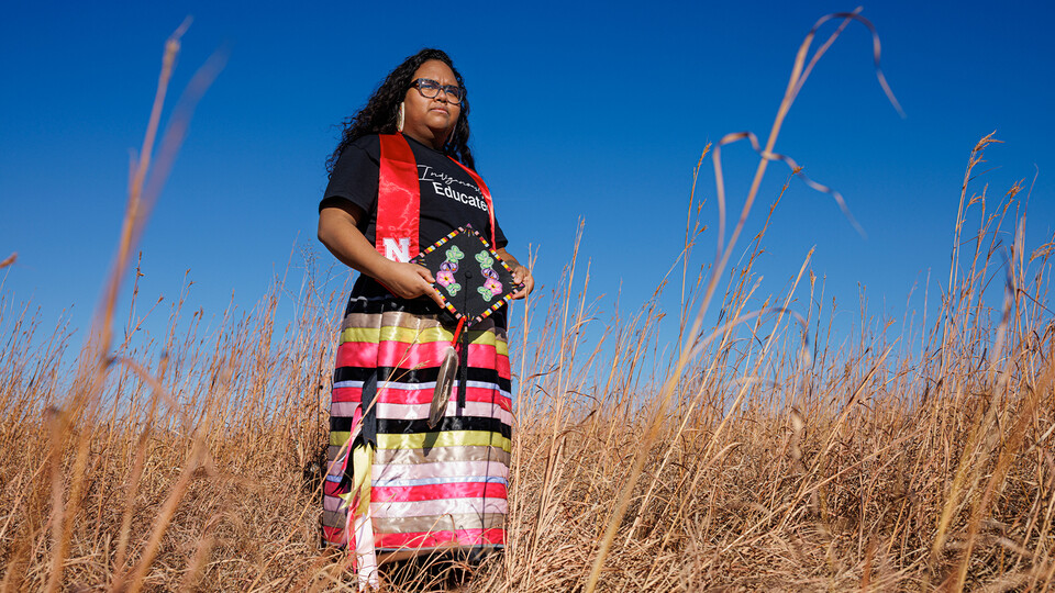 For the graduation ceremony, Nasia is wearing a traditional medicine skirt to express her Indigenous pride. 