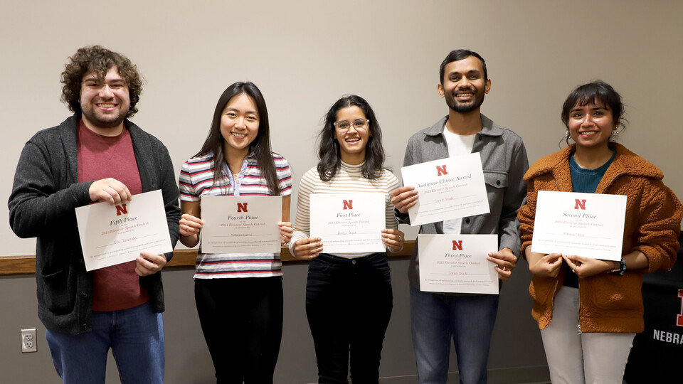 Graduate students in agronomy and horticulture, entomology and plant pathology hold certificates from elevator-speech contest