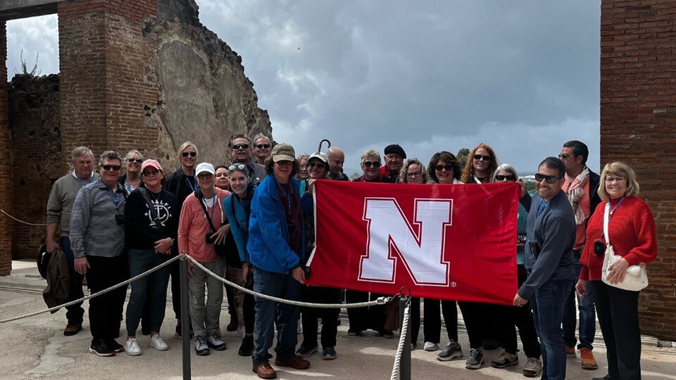 Nebraska Alumni Association members stopped to show their Husker spirit during a travel opportunity to Pompeii. Learn more at https://go.unl.edu/98ph.
