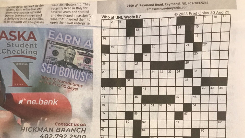 A crossword puzzle with the headline "Who at UNL Wrote It?"