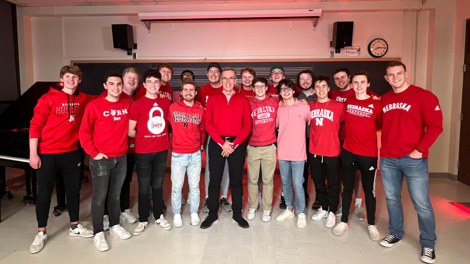 Chancellor Ronnie Green (center) hung out with the Bathtub Dogs on Feb. 8, working with the a cappella group on a surprise for the university’s Charter Week. Learn more at https://go.unl.edu/zvtu.