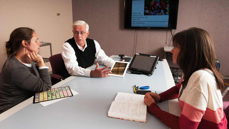 Dave Beukelman meets with Barkley Memorial Center colleagues in this 2011 photo. He served 29 years with the university and was the Barkley Professor of Communication Disorders.