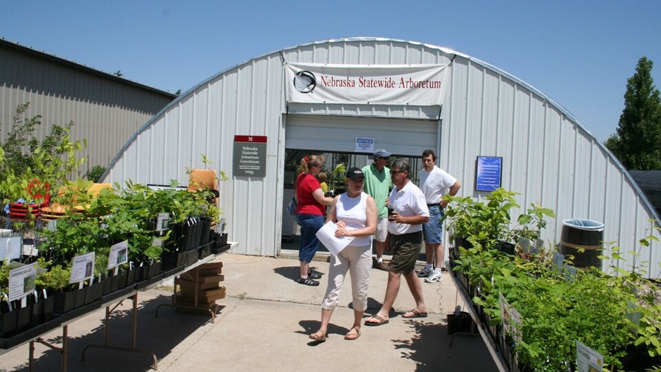 Shoppers seek plants at the Nebraska Statewide Arboretum sale on East Campus.