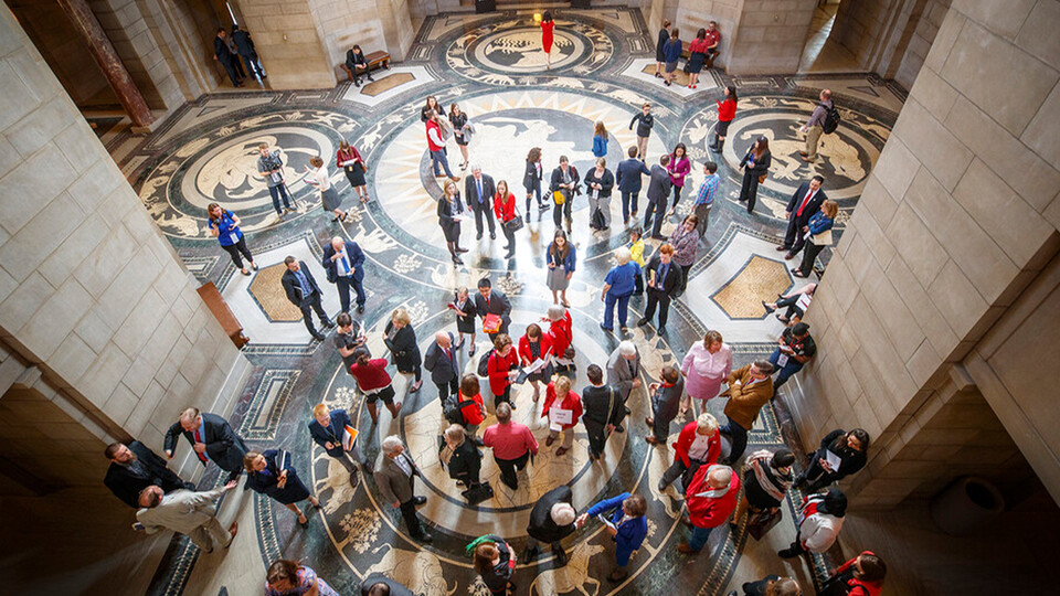 Husker supporters inside the Nebraska State Capitol