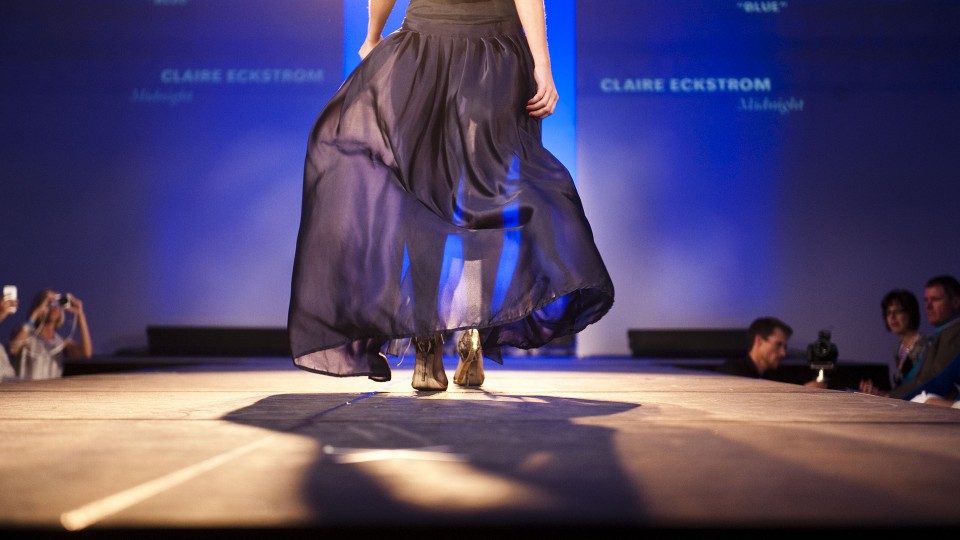 A model walks the runway during the 2014 Biennial Student Runway Show.