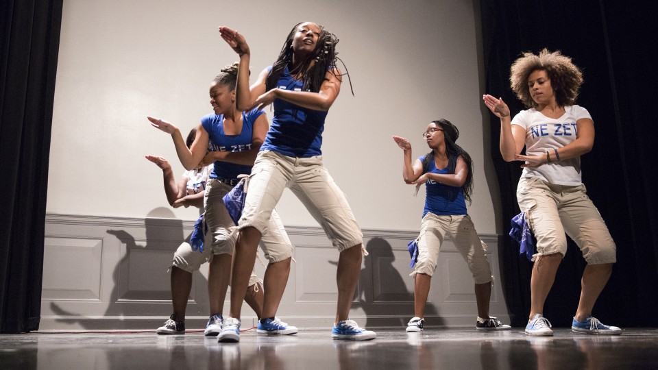 Women from Zeta Phi Beta perform a dance routine during the 2014 OASIS Stroll Off Competition in the Nebraska Union. The annual competition is Sept. 9.