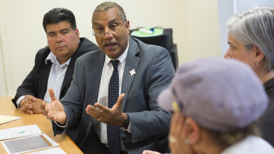 Joseph Francisco (center), dean of Arts and Sciences, discusses the new policy with ethnic studies faculty on April 20. The new policy is designed to help ethnic studies attract and retain cutting-edge professors.