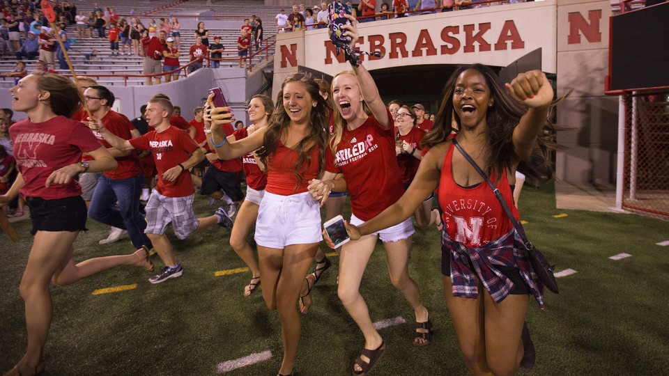 New students flow onto the field of Memorial Stadium during the annual Tunnel Walk, held Aug. 21.
