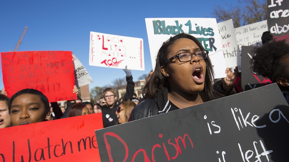 Students react during the Nov. 19 "Black Lives Matter" rally at UNL. The event featured student speakers talking about their experiences at UNL.