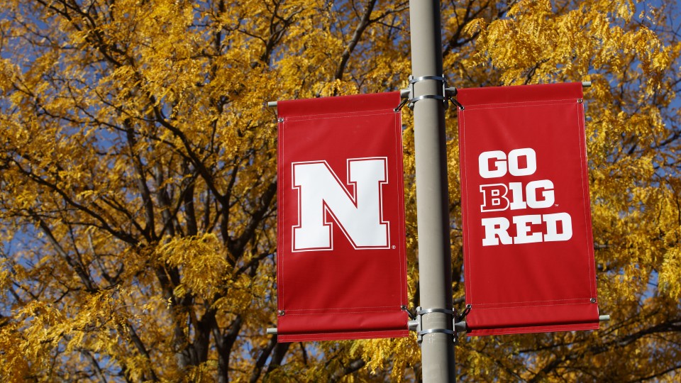 Nebraska banner with yellow leaves in background