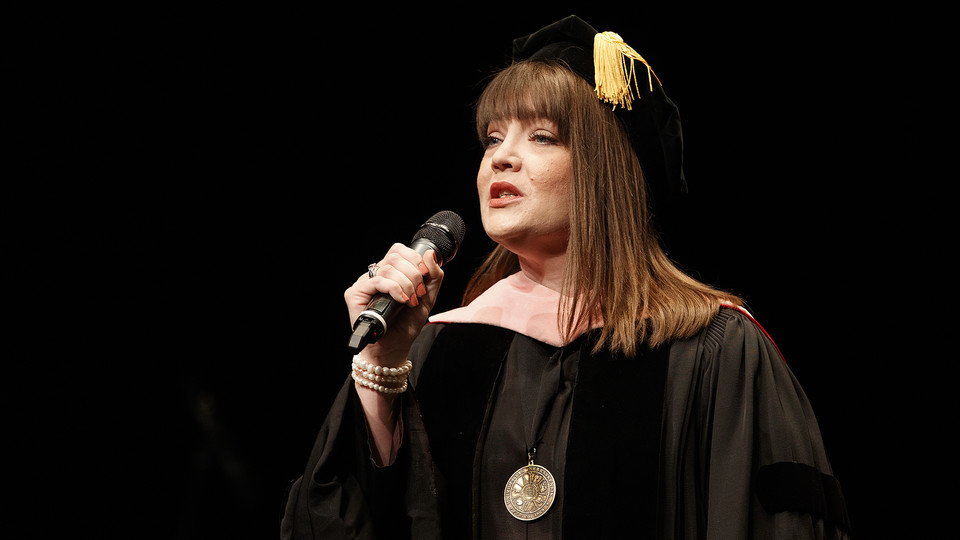 Nebraska’s Jamie Reimer, assistant professor of voice, sings the National Anthem during Chancellor Ronnie Green’s installation on April 6, 2017. Reimer will perform in a faculty recital on Sept. 20.