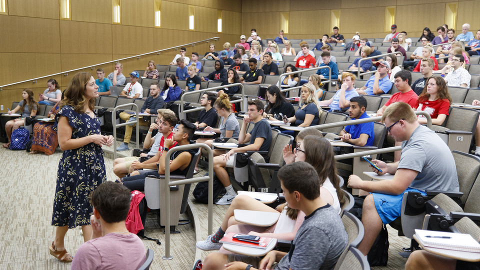Students listen to a presentation in the large lecture hall in Howard L. Hawks Hall on the first day of the 2017 spring semester. Nebraska is relaunching the Century Club, a group that provides assistance to teachers of classes of 100 or more students.