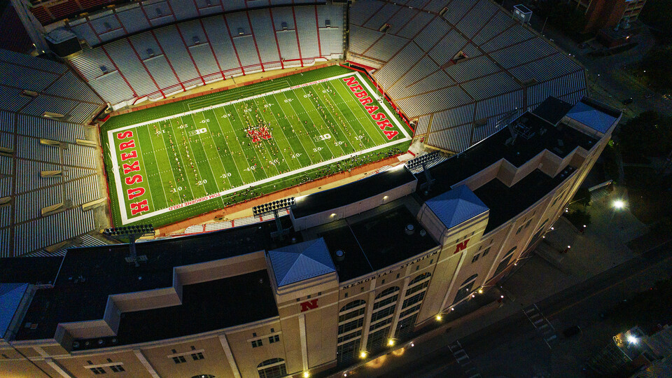 The Cornhusker Marching Band practices in Memorial Stadium in 2019.