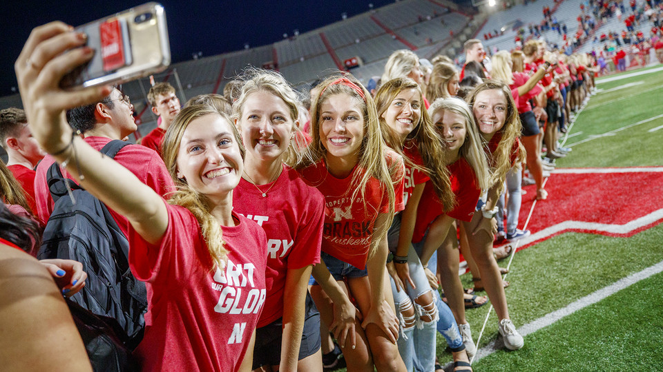 Husker freshmen pose for a selfie during the Tunnel Walk in Memorial Stadium on Aug. 24. Big Red Welcome events on campus have expanded to cover the first six weeks of the fall semester.