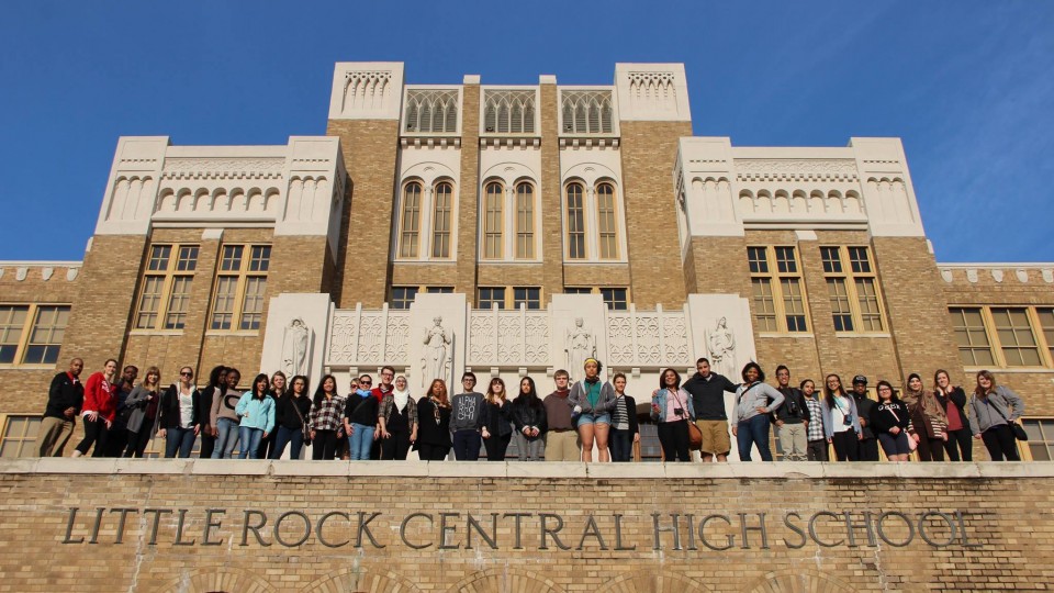 Students from UNL's William H. Thompson Scholars Learning Community pose in front of Central High School in Little Rock, Ark., during their civil rights-focused service learning trip.