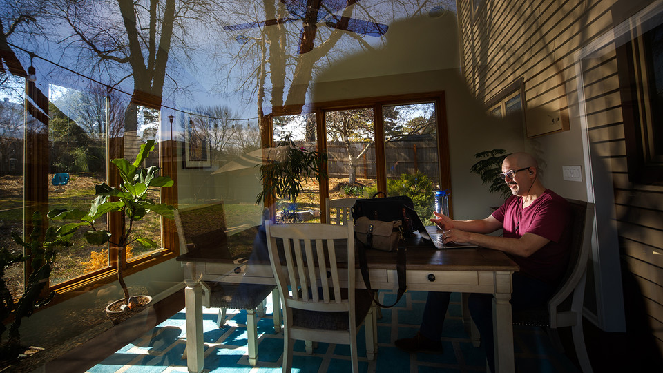 Walker Pickering, assistant professor of art, works in his home office/backyard sunroom. University Communication is launching a Home Office of the Week honor starting April 10.