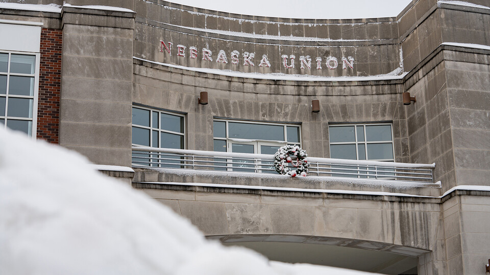 The north façade of the Nebraska Union is covered in snow after wintery conditions arrived in Lincoln during the Dec. 12-13 weekend. 