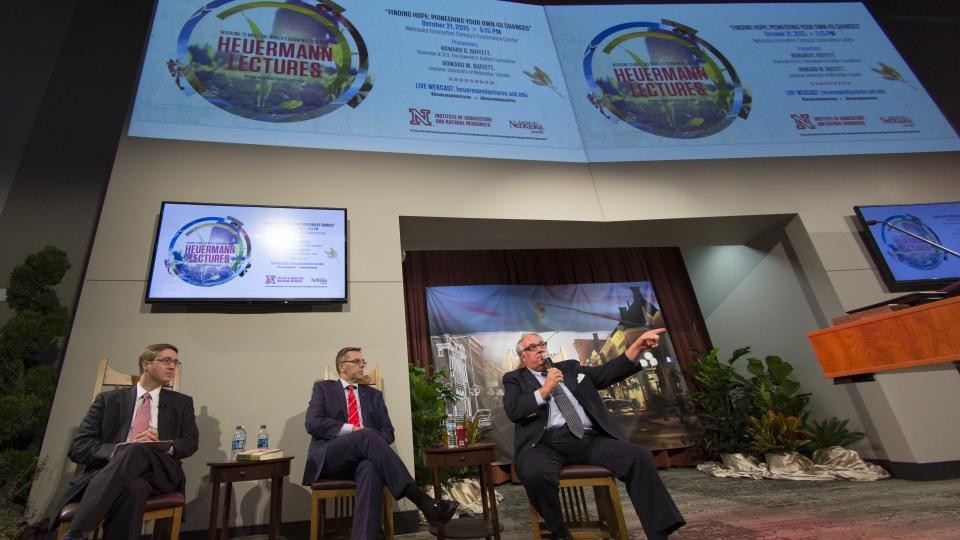 Howard G. Buffett (right) speaks during the Heuermann Lecture Oct. 21 at Nebraska Innovation Campus. Also on stage are speaker Howard W. Buffett (left) and moderator Ronnie Green, University of Nebraska vice president, IANR Harlan Vice Chancellor and interim senior vice chancellor for academic affairs at UNL.