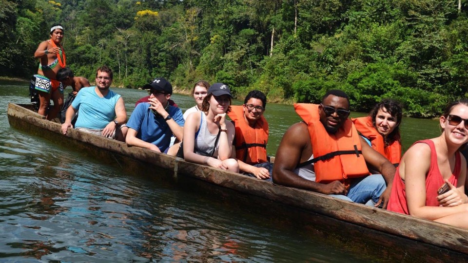 University of Nebraska-Lincoln students travel by boat to the Embera Drua indigenous community in Panama. Those pictured are (from left) Lucas Kahnk, Joseph Gomez, Debbie Seeley, trip sponsor J.K. Osiri, Corrin Bemis, Max Camey, Talia Halperin and Jacy Spencer.