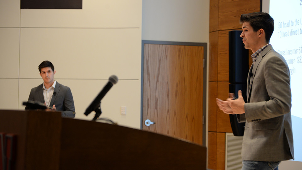 Joseph Brugger (left) and Matthew Brugger (right) pitch their company, Upstream Farms, to judges during the final round of the New Venture Competition. The brothers were named co-champions of the competition and won $25,000.