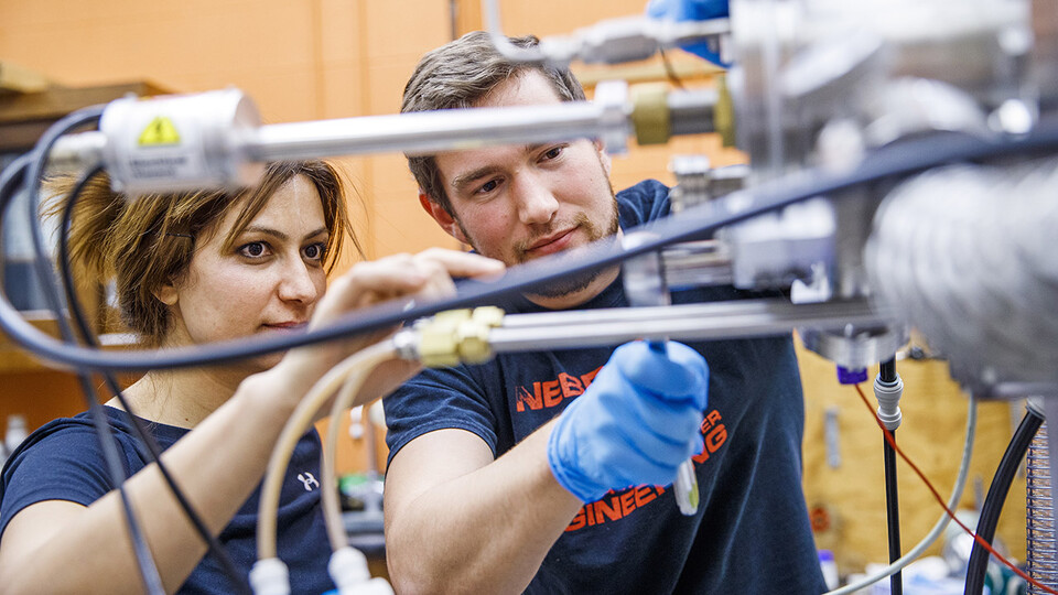 Graduate students Zahra Ahmadi and Mark Anderson work in the Scott Engineering Center in November 2019. Beyond developing students individually, the new Peter Kiewit Foundation Engineering Academy in the College of Engineering will increase access and enhance diversity by removing financial barriers to engineering education and encouraging and supporting more Nebraska women to pursue careers in engineering, computing and construction.