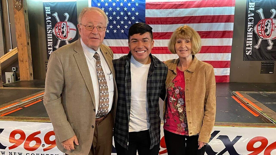 Mainor Ramirez Tercero (center) attended President Carter's tailgate celebration in fall 2022 with his mentors and benefactors Dr. Klaus and Gisela Hartmann.