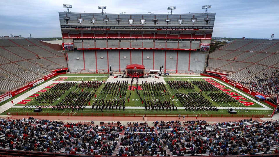 Graduates receive their degrees during May 2021 undergraduate commencement at Memorial Stadium