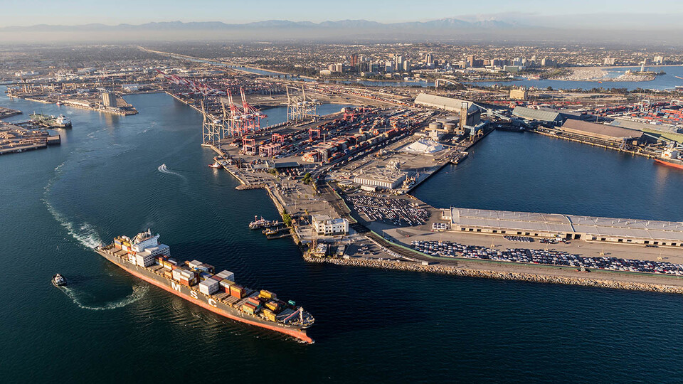 A cargo ship outside of a harbor in Long Beach, California