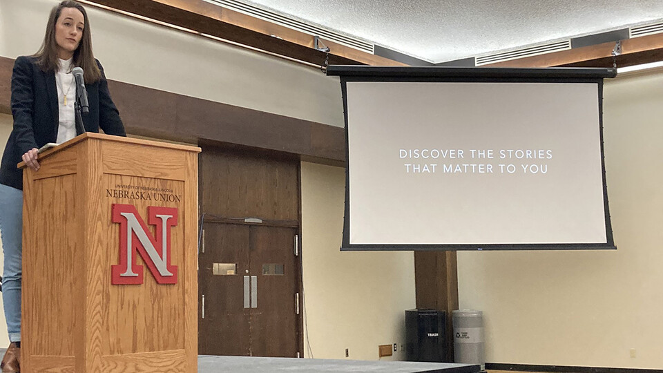Alyssa Schukar, a Washington, D.C.-based photojournalist, educator and writer, delivers the keynote presentation during the Nebraska High School Press Association convention on Oct. 17.