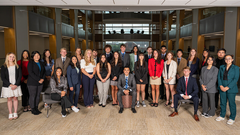 Twenty-eight members of the second cohort of Inclusive Business Leaders pose for a photograph in Hawks Hall.