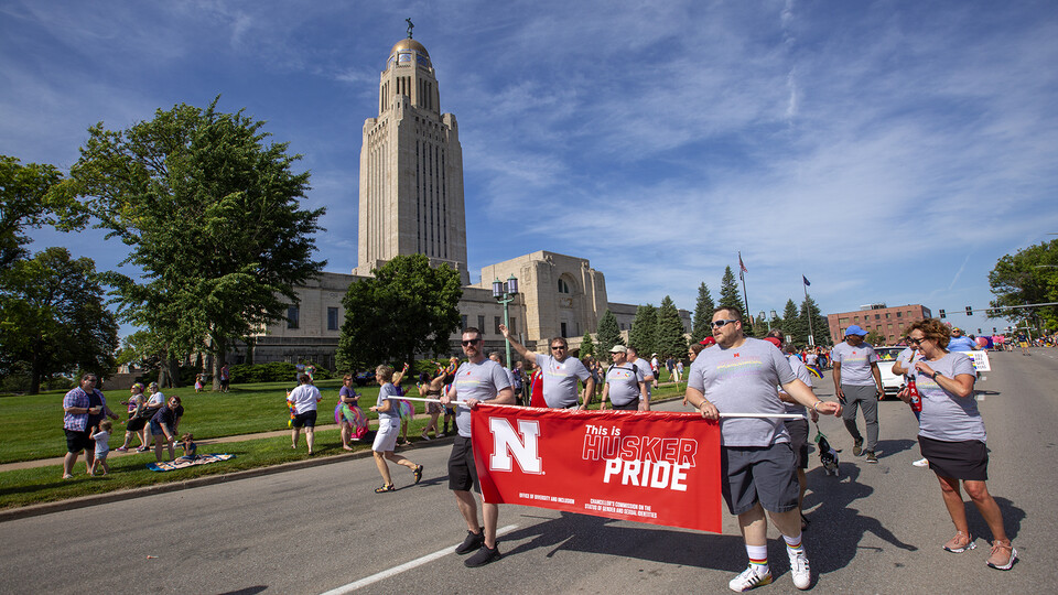 The Husker Pride group walks the parade route around the Nebraska State Capitol on June 19. Thousands attended the inaugural parade.