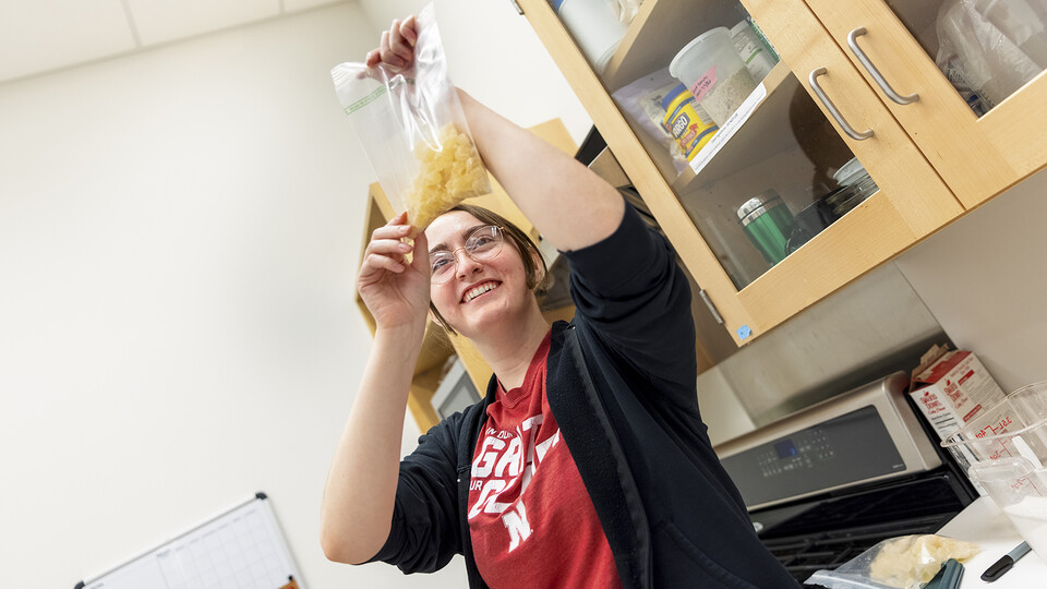 April Johnson is one of a number of Huskers learning real-world career skills in the in the product development lab at the Food Innovation Center. One of the lab's clients is a company testing a pectin replacement for gummies.