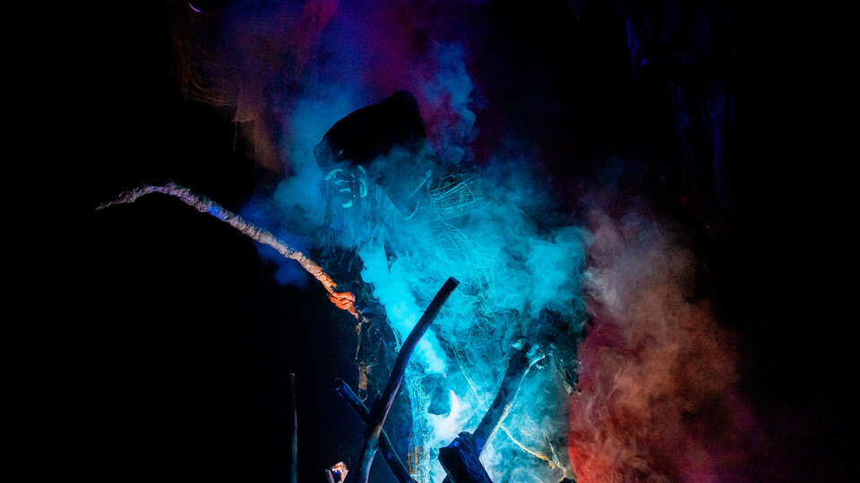 Smoke frames a witch in the Nebraska Rep production of "ShakesFear."