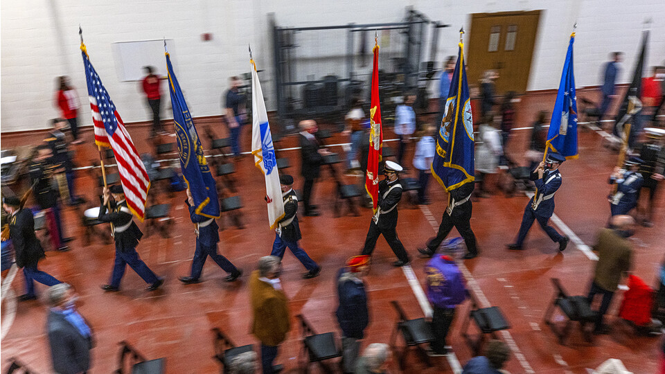 An ROTC Color Guard retires the colors at the start of the Veterans’ Tribute project celebration on Nov. 5 in the Pershing Military and Naval Science Building. The university will host a National Roll Call event on Veterans Day.