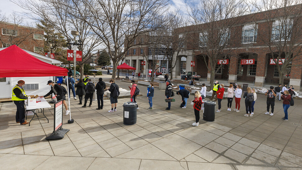 Students line up for COVID-19 testing outside the Nebraska Union as classes opened on Jan. 18.