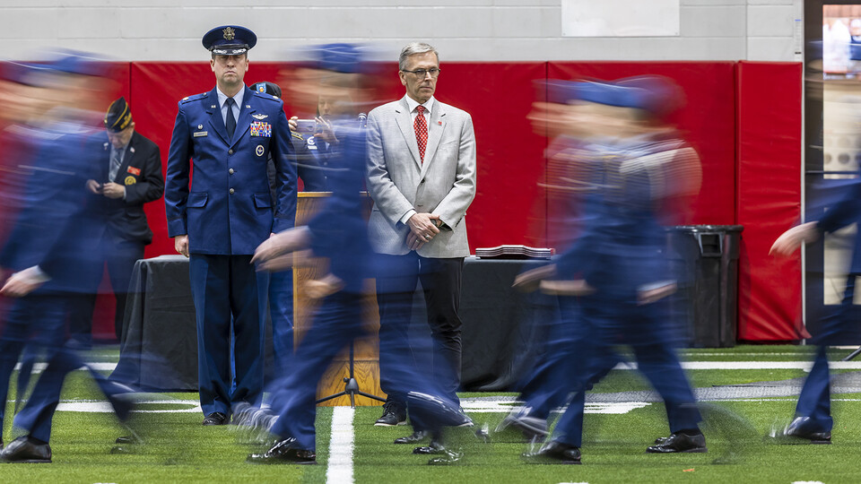  Air Force Lt. Col. C.J. Zaworski and Chancellor Ronnie Green review the cadets as they pass in review on April 21 in Cook Pavilion.